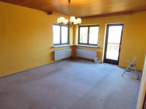 Wohnzimmer mit Ausgang auf die Ostterrasse